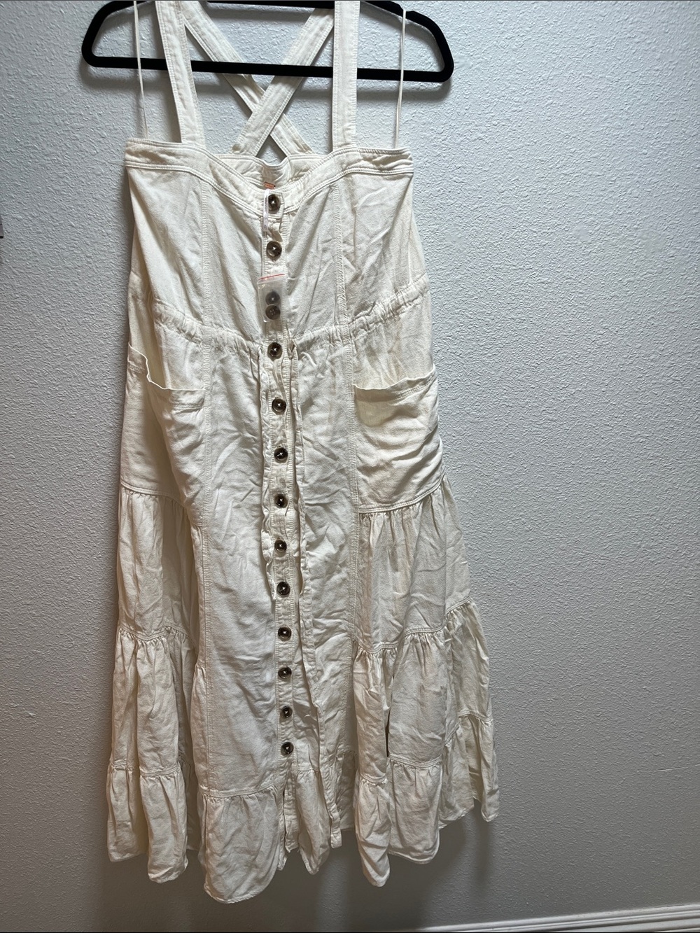 Free People Linen Cream Button-Front Tiered dress, Cross Straps, pockets.